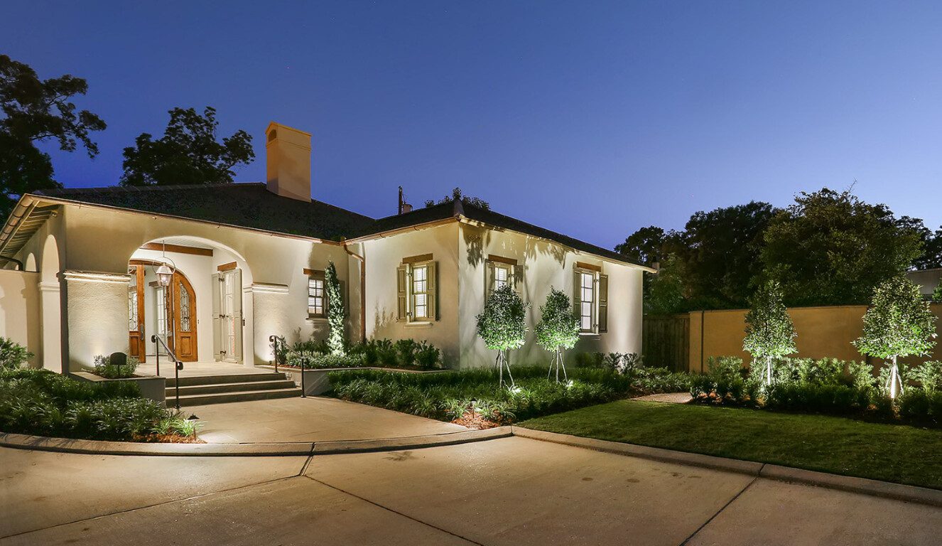 Newly installed concrete walkway with decorative border at a Fort Pierce, FL home